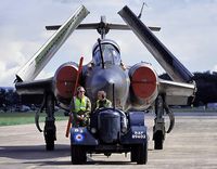 XN974 @ EGYK - Being towed back to the static area by a vintage RAF tug after developing some sort of brake problem thus denying us all of the fast run it usually did!!