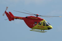 OY-HLT @ EKRK - BK117B-2 medical evacuation helicopter operated by Falck DRF Luftambulance flying over Roskilde airport, Denmark. - by Henk van Capelle