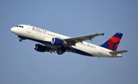 N351NW @ KLAX - Departing LAX on 25R - by Todd Royer