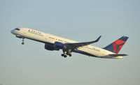 N649DL @ KLAX - Departing LAX on 25R - by Todd Royer