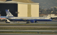 N579UA @ KLAX - Taxiing to Gate - by Todd Royer