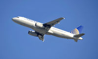 N465UA @ KLAX - Departing LAX on 25R - by Todd Royer