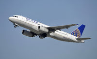 N464UA @ KLAX - Departing LAX on 25R - by Todd Royer