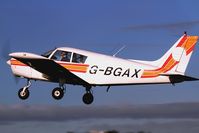 G-BGAX @ BREIGHTON - Departing to the west