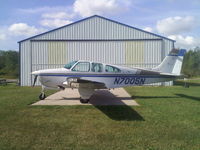 N7005N @ D51 - The Bonanza infront of the family Hangar at the Clarence Aerodrome - by Joe Rizzo