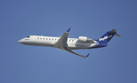 N693BR @ KLAX - Departing LAX on 25R - by Todd Royer