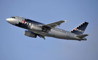 N527NK @ KLAX - Departing LAX on 25R - by Todd Royer