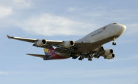HL7415 @ KLAX - Arriving on 24R - by Todd Royer
