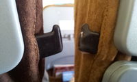 PK-GEO @ CGK - protruding metal hinges potantially dangerous to passangers in case of impact. - by Ning M Widjaja