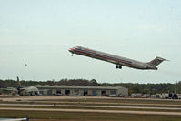 N595AA @ RSW - MD-83 taking off at RSW