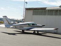 N7720P @ CNO - Parked by a hanger - by Helicopterfriend