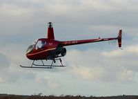 G-LINS @ EGFH - Resident  R-22 operated by Heli-air Wales. - by Roger Winser