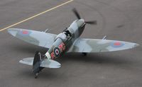 G-PIXY @ EGNE - A Spitfire is born - first flight of Richard Collenettes Mk26 Supermarine Spitfire built from a kit over five years - an 80% scale all aluminium replia powered by a 260HP V6 engine. The test pilot was Dan Griffith for this first ten minute flight. - by Jim Stone