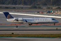 N934SW @ LAX - United Express (SkyWest Airlines) N934SW (FLT SKW6235) taxiing to Gate 86 after arrival from Portland Int'l (KPDX) on the North complex.