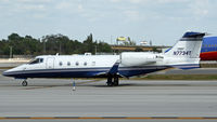 N7734T @ FLL - passing my lense - by Gert-Jan Vis