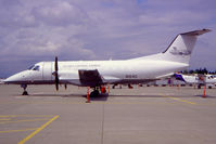 N164D @ KSEA - Seen on this remote cargo ramp at SEA was this EMB120 for Alaska Central Express.  Photo - by Joe G. Walker