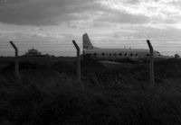 VW826 @ EGWU - Moody view of RAF Vickers Valetta C.1 at dusk on the fire practice area at RAF Northolt in 1964. - by moxy