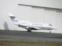 XA-LUN @ ONT - Parked by the hanger on the south side - by Helicopterfriend