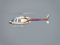 N90107 @ POC - On final over runway 26R heading to the hangers on the northwest area - by Helicopterfriend