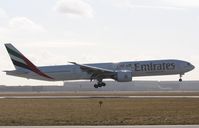 A6-ECJ @ EHAM - Landing rw27 - by ghans
