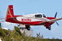 N242RJ @ TNCM - landing sxm - by martial Dekker