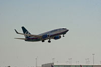 N337AT @ RSW - 737 taking off at RSW - by Mauricio Morro