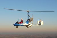 G-BZJM - VPM Gyro now fitted with a Subaru engine. Pilot Andy habgood flying over lincolnshire with holbeach town in the background. - by Scott