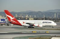 VH-OQG @ KLAX - Taxiing to gate at LAX - by Todd Royer