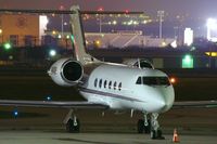 N401QS @ KSAT - Parked - by RWB