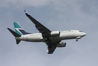 C-FWBG @ MCO - West Jet 737 - by Florida Metal