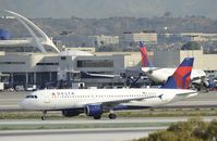 N317US @ KLAX - Arrived at LAX on 25L - by Todd Royer