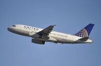 N847UA @ KLAX - Departing LAX on 25R - by Todd Royer