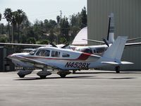N4528X @ POC - Parked by Howard Aviation - by Helicopterfriend