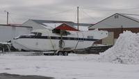N611SS @ KANE - Parked behind a hangar @ KANE - by Ed Wells