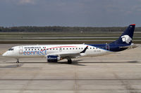 XA-AAC @ IAH - While waiting for my flight to Amsterdam, this beautiful Embraer surprised me. - by Connector