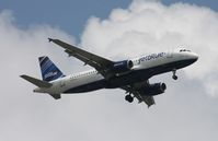 N584JB @ MCO - Blue Fox - by Florida Metal