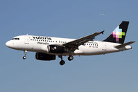 XA-VOT @ LAX - Volaris Horacio XA-VOT on short final to RWY 25L. - by Dean Heald