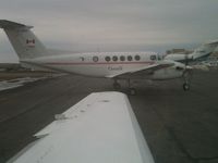 C-GDVF @ CYOW - beech 200 parked on the ramp - by christian maurer