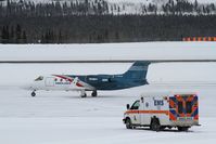 C-GHJU @ CYXY - Taxiing for takeoff after loading a medivac passenger from the vehicle-ambulance. - by Murray Lundberg