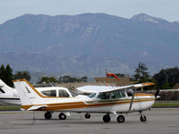 N6610D @ OXR - 1979 Cessna 172N SKYHAWK II, Lycoming O-320-H2AD 160 Hp, 6,704' Hines Peak of the Topa Topa Mountains in right background. Central massif is 6,244'. Rwy 25 windsock shows prevailing less than 15 knot onshore wind - by Doug Robertson