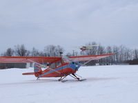 N1486E @ D51 - 1355A on final for 10; nice Champ in the foreground during our winter fly-in (celebrating Buffalo, NY weather) - by Jim Uber