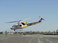 N14LA @ POC - Fueling hose & ground removed, ship is up and heading north towards the mountains - by Helicopterfriend