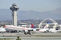 B-6050 @ KLAX - Departing LAX on 25R - by Todd Royer