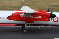 D-ABQJ @ EDDL - main gear Dash 8 - by Loetsch Andreas