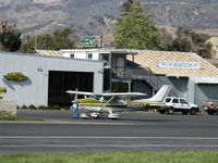 N562AT @ SZP - 1974 Cessna 182P SKYLANE, Continental O-470-S 230 Hp, refueling - by Doug Robertson