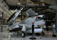 135300 @ KNPA - Douglas A-1H Skyraider fully bombed up, restored displaying the markings of VA-25, and currently being exhibited at the National Museum of Naval Aviation, NAS Pensacola, FL.