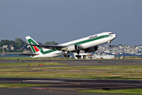 EI-DBP @ BOS - Logan Airport firehouse and Boston harbor are in the background as this 767 heads out. - by James Reppucci