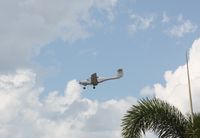 N658DS @ APF - Final approach at Naples Municipal - by billpahl