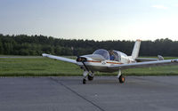 OO-TOT @ EBUL - OO-TOT in 1985, engine switched off after some solo training - me clearing the ol' eustachian tubes after landing. - by Reinout Goddyn