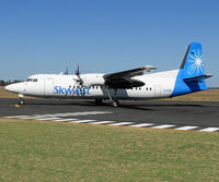 VH-FNE @ YBLN - Arriving at the parking.